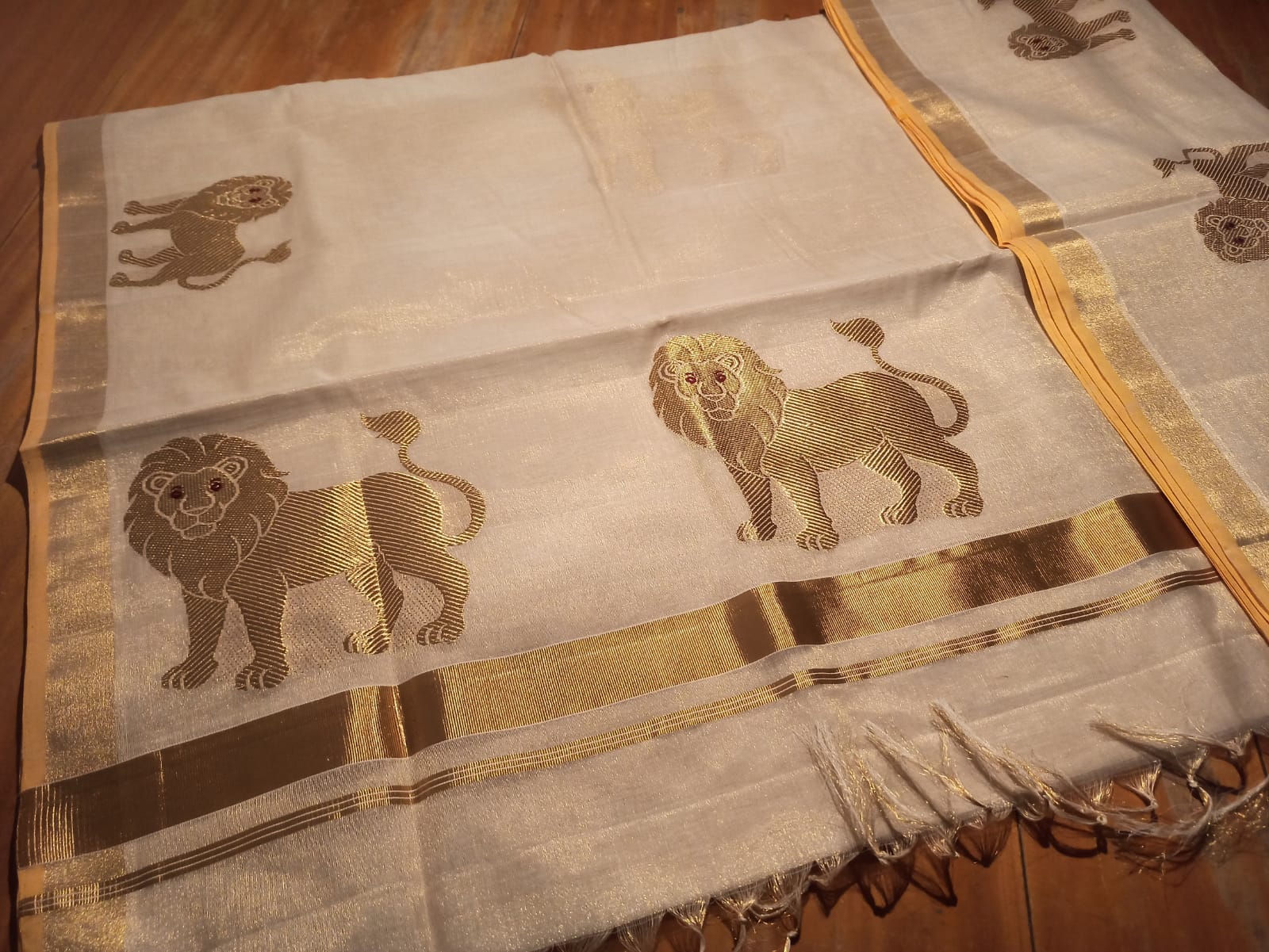 Pure Handloom Tissue Saree with Golden Lion Motif