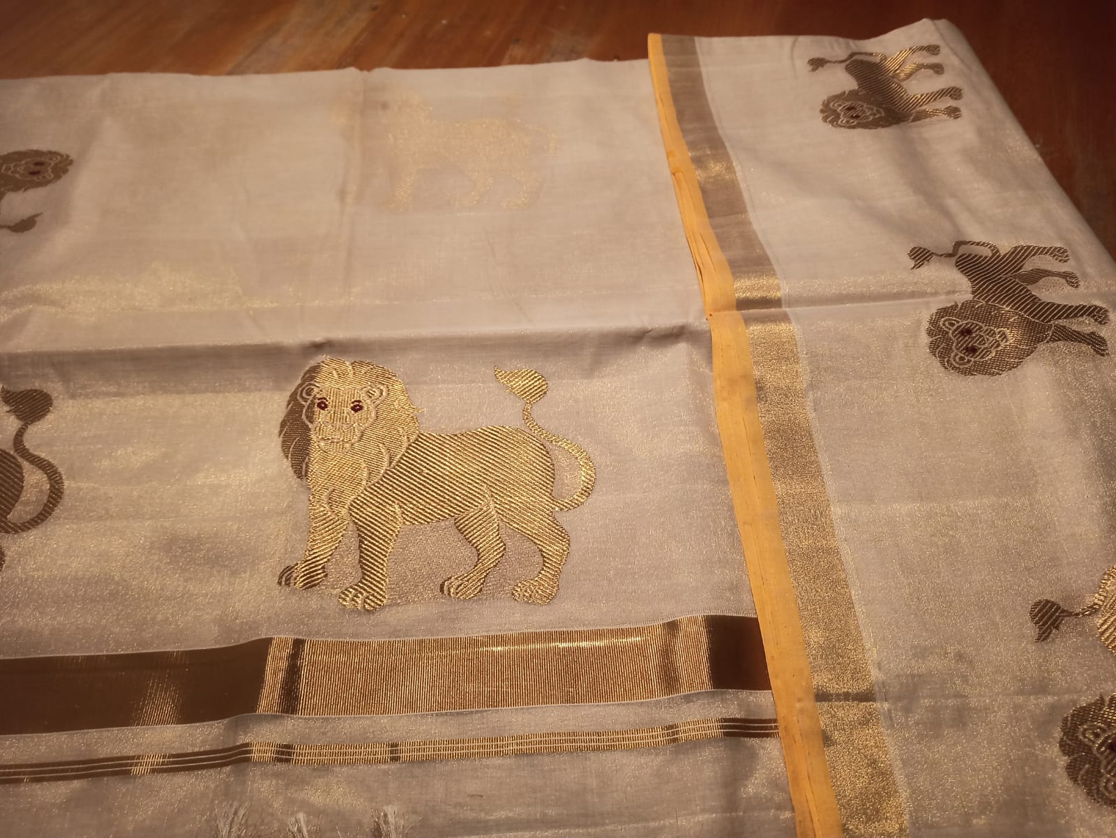 Pure Handloom Tissue Saree with Golden Lion Motif - Image 3